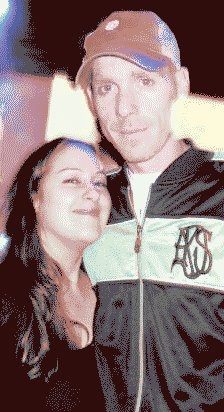 DJ Natural Nate® and Jiggabot together at a venue, AKS jacket, warm tones
